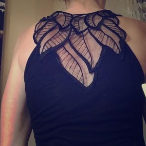 Black tunic sheer with design on back